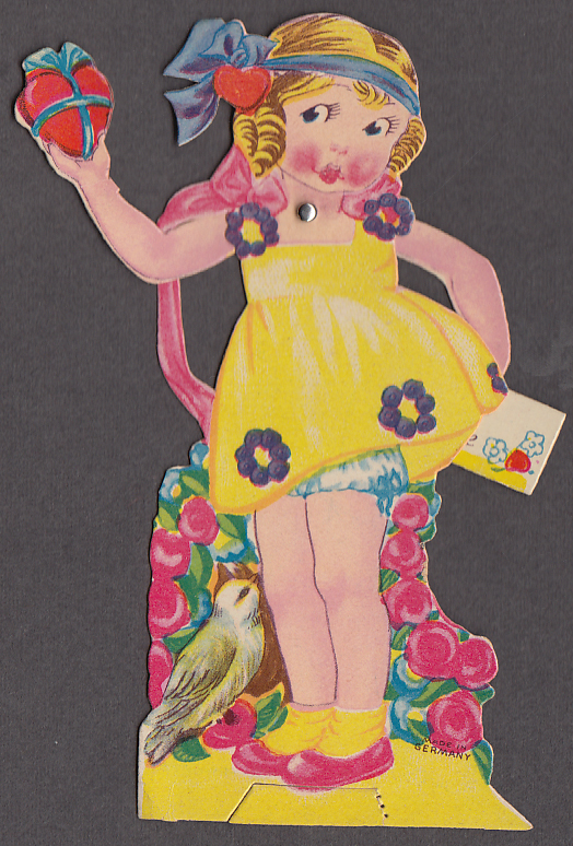 Blonde little girl with heart in hand mechanical Valentine card 1930s